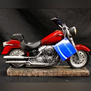 The World of Wonders Easy Rider wine holder is about 12 inches tall. It was feat
